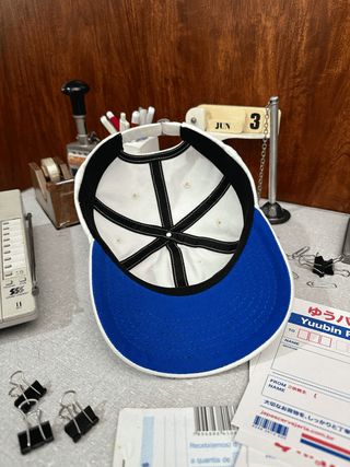 Boné Dad Hat YU-PACK Off White